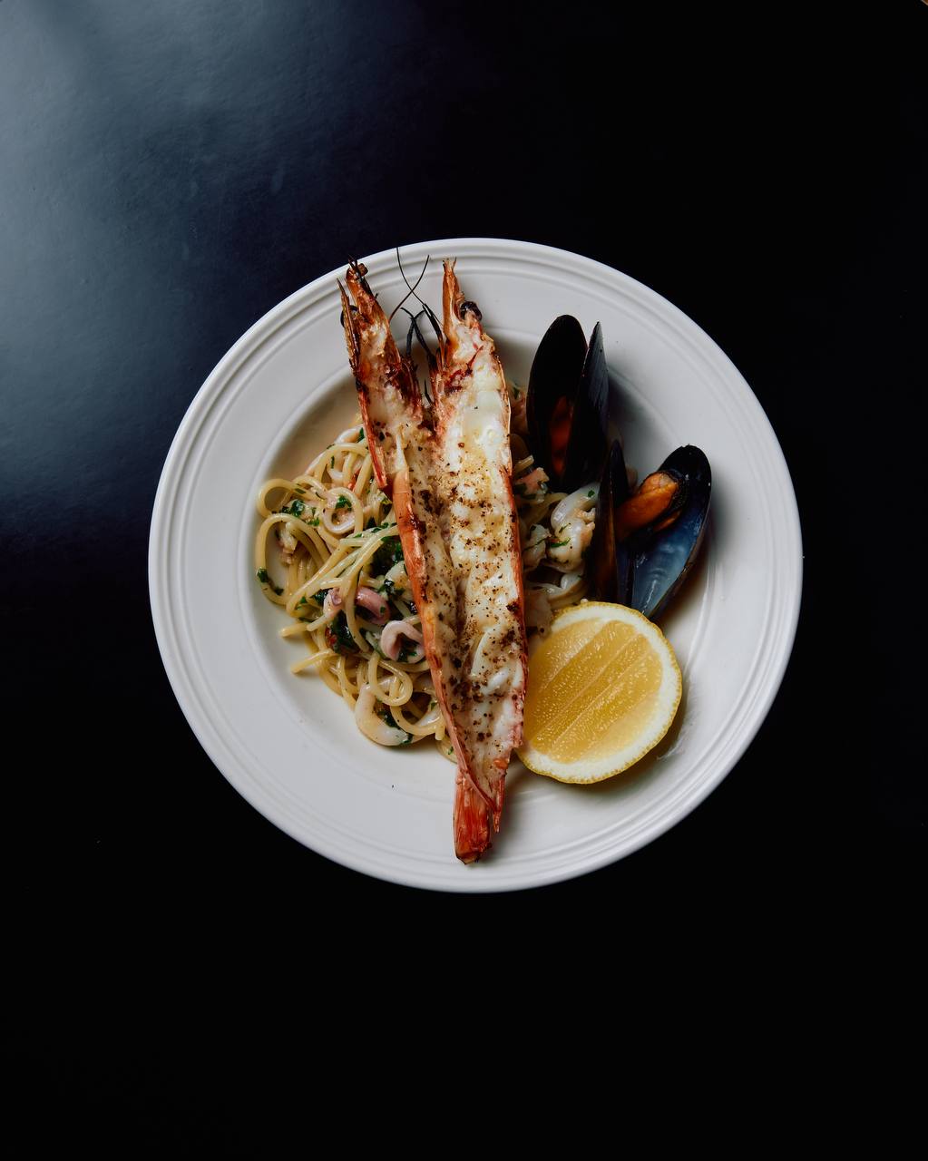 Spaghetti marinara with grilled king prawn